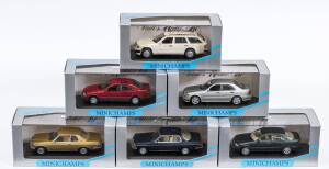 MINICHAMPS: 1:43 group of Mercedes model cars including AMG-Mercedes C 36 (32161) - Light Yellow; and, Mercedes 250 TD (32102) – Taxi Deutschland; and, Mercedes-Benz W 123 Break 300 T (32210) – Red. All mint in original perspex display case. (29 items)