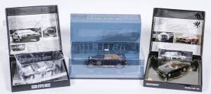 MINICHAMPS: 1:43 group of model cars in display boxes Including Horch 853A (2030) – Black; and, 1981 DeLorean DMC 12 (140020) – Silver; and, Chaparral 2H Can Am Edmonton 1969 (43039) – John Surtees. All mint in original perspex display case or cardboard d