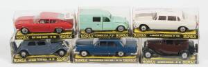 NOREV: Group of model cars including Simca 5 (24) – Orange; and, Peugeot 201 (6) – Off Green; and, Peugeot Torpedo 172R – 8. All mint in original plastic bubble display case. (20 items)