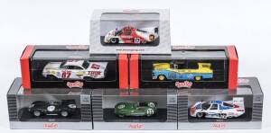 QUARTZO: 1:43 group of model cars including Ford Fairlane 56 (1017) – Mel Larson; and, Impala Coupe 59 (1001) – Buck Baker; and, 1954 Jaguar D Type (QLM021) – #14 Rolt/Hamilton 2nd Le Mans. All mint in original perspex display cases. (9 items)