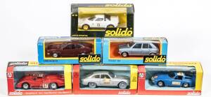 SOLIDO: Group of model cars including Jaguar XJ12 (1096) – Black; and, Toyota Celica (1094) – Cream; and, Lancia Stratos (73) – Blue. All mint in original cardboard packaging. (120 items)