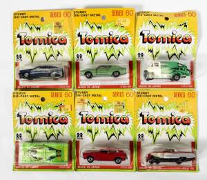 TOMICA: Group of blister pack model cars including Corolla Levin (78); and, BLMC Mini Cooper S (F8); and, Mercedes Benz 300 SL (F19). All mint and unopened on original cardboard card (88 items).