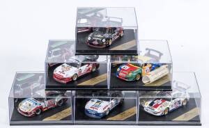 VITESSE: 1:43 group of Porsche model cars including 1995 Le Mans Porsche 911 GT2 (065A) &ndash; Repsol #91; and, 1999 Porsche 911 Carrera (WMC99022) &ndash; Metallic Black; and, Porsche 911 GT2 (065F) &ndash; Blue Coral #46. All mint in original perspex display cases. (10 