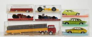 Miscellaneous Group of small scale model cars including SCHUCO: Mercedes 450 SE (301-873); and, PUNCH; MacLaren F1 M7A &lsquo;Spa&rsquo;; and, CHAMPION: Tyrrell-Ford F1. All mint to near mint in original perspex display cases. (55 items)