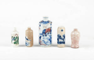 A Chinese blue and white and unglazed snuff bottle decorated with animal, 11.7cm high and four other Chinese porcelain snuff bottles 7.5 to 8.25cm high