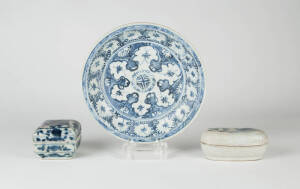 A Chinese blue and white circular dish and two covered boxes, 16th/17th Century; 15cm diameter, one box 9cm square the other 13cm wide overall