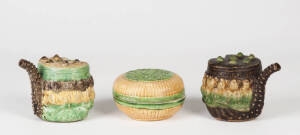 A pair of yellow, green and brown glaze drum shaped ewers