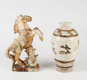A Cizhou earthenware vase 28cm high and a Tang style Sancai glazed rearing horse