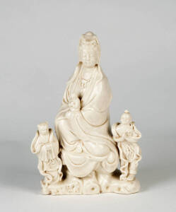 A blanc-de-Chine figure of Guanyin with attendants, 26cm high&nbsp;