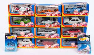 HOTWHEELS: group of model cars including twelve 1:25 such as Audi Quatro; and Talbot Horizon; and, Ferrari 126C. Also includes five blister packs such as Sharkruiser (3286). All mint in original cardboard packaging. (17 items)