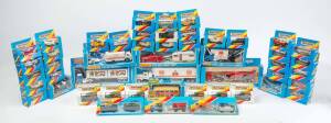 MATCHBOX: group of model 1-75 cars with an inclusion of 8 from the 'SuperKings' Series such as Aircraft Transporter (K-106); and, Container Truck (K-17); and, Burger King Peterbilt Refrigeration Truck (K-31). Most mint, all in original cardboard boxes. (4