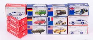 TOMICA: group of model cars including Pontiac Firebird Transam (F13); and, Volkswagen Microbus (F29); and, Ford Continental Mark IV (F4); and Porsche 956 (F36 types B-E). All mint in original cardboard packaging. (20 items).