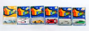 TOMICA: group of model cars including Ferrari 312 T3; and, Citroen SM; and, Jaguar XJ-S. All mint in original cardboard packaging. (45 items)