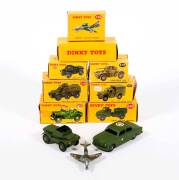 DINKY: 1950s group of military vehicles including Army Water Tanker (643); and Armoured Personnel Carrier (676); and, Scout Car (673). Most mint, all in original yellow cardboard boxes. Slight damage to some of the boxes. (8 items)