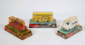 DINKY: 1970s group of model vehicles including ‘Yellow Pages’ Atlanta Bus (295); and Range Rover Ambulance (268); and, Land Rover Fire Appliance (282). All mint in original bubble packs. (3 items)