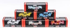 QUARTZO: 1:43 group of model cars including Kremer K3 (3016) – 'Swap Shop'; and, BMW 320 Gr.5 (72) – Gosser Beer; and, Ford Thunderbird (2017) – McDonalds Hut Stricklin. All mint in original perspex display cases. (20 items)