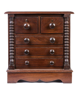 A miniature chest of drawers with half bobbin columns, Australian cedar, 19th century ​Note: Restoration work done in the 20th century revealed the mark for J. SLY the famed Sydney cabinet maker, this piece would appear to be the work of an apprentice of 