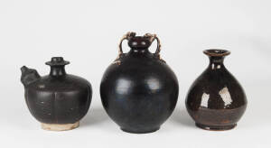 A brown glazed lobed circular Kendi, 16cm high and two brown glazed vases, 17 and 18cm high&nbsp;