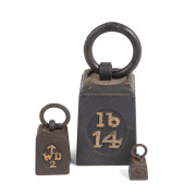 Set of three weights with W.D. Government broad arrow mark, 19th century