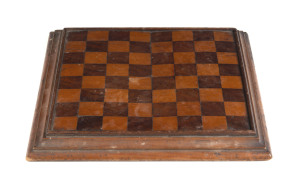 An Australian inlaid chess board, cedar and pine, 19th century, together with a specimen wood stand, New Zealand, 20th century