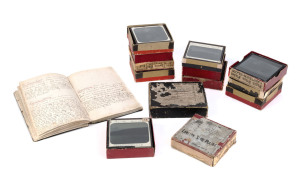 Important collection of glass plate lantern slides with accompanying hand written book of various slide programs. Collection features rare photographs of TASMANIAN ABORIGINES