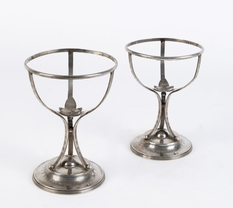 A pair of emu egg stands, sterling silver, Sheffield, circa 1860