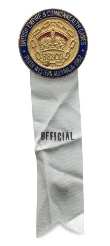 1962 COMMONWEALTH GAMES IN PERTH, Official's Badge, enamelled with "British Empire & Commonwealth Games/ Perth, Western Australia, 1962", pale green ribbon printed "OFFICIAL".
