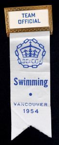 1954 BRITISH EMPIRE GAMES IN VANCOUVER, Official's badge "TEAM OFFICIAL", with white ribbon printed "SWIMMING/VANCOUVER 1954". Ex British swimming coach Harry Koskie.