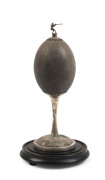 An Australian rifle trophy, silver plate with mounted emu egg in glass dome, 19th century - 2