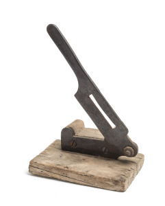A tobacco cutter, iron and redgum, 19th century
