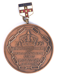 1966 COMMONWEALTH GAMES IN JAMAICA, 3rd Place Winner's Medal "1966 VIII British Empire and Commonwealth Games, Kingston, Jamaica", 57mm diameter, with one link of the chain.