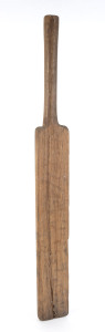 A folk art cricket bat, carved from a single piece of eucalyptus hardwood, early 20th century