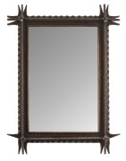 An impressive tramp art framed mirror, carved Australian cedar, circa 1900