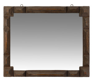 A tramp art framed mirror, carved Australian cedar, late 19th century