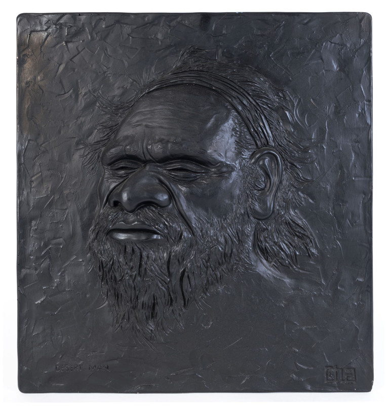 "DESERT MAN" Plaque, ebonized plaster, mid 20th century