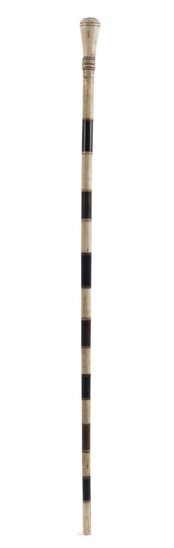 A whalebone walkingstick with turned segments of ebony, baleen and casuarina with whale tooth handle, Tasmanian origin, 19th century