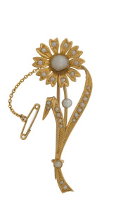 A 15ct yellow gold floral bar brooch encrusted with seed pearl, by William Drummond & Co. Melbourne, 19th century