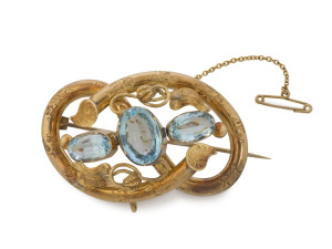 A fine Victorian yellow gold brooch set with three aquamarines, attributed to C. Marks & Co. Ballarat