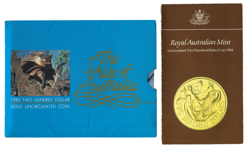 GOLD COINS OF AUSTRALIA: 1984 $200 Koala, 1989 $200 Frilled neck lizard; both in original cards, as issued and uncirculated. (2).