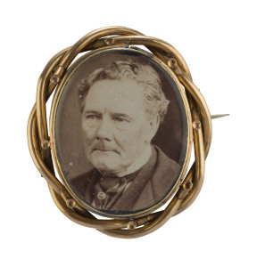 A pinchbeck photo portrait brooch, 19th century, purported to be of the bushranger Harry Power famed for mentoring Ned Kelly in the ways of bushranging when he was just a teenager