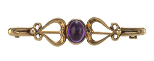 Two Australian yellow gold bar brooches set with cabochon amethyst and cut sapphire, late 19th early 20th century