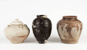 a Straw glazed ovoid jarlet and cover 17cm high and two brown glazed jars 19cm high