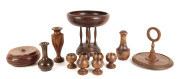 A group of 12 pieces of Australian treen ware including a blackwood comport, huon pine box, 3 vases and an egg cruet, 19th and 20th century