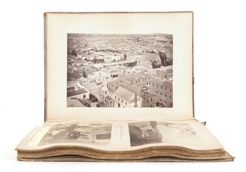 BALLARAT, TASMANIA & SYDNEY: c1870s cloth-covered photo album (dilapidated) with "TASMANIAN SCENES" in gilt to front cover; containing 54 albumen print images affixed to the thick card leaves, together with 3 additional iames loosely inserted at the back.