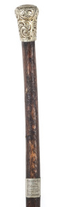 A whale's penis walkingstick with white metal handle and collar engraved "PRESENTED TO P. MARTEL by MINING DEP.T, MELBOURNE" 19th century