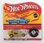 HOTWHEELS: 1971 Redline Ice ‘T’ (6184) – Yellow with yellow plastic roof. Mint and unopened in original unpunched flame blister pack.