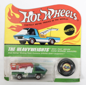 HOTWHEELS: 1971 Redline ‘The Heavyweights’ Snorkel (6020) – Spectral Flame Green Cab with red plastic snorkel. Mint and unopened in original flame blister pack.