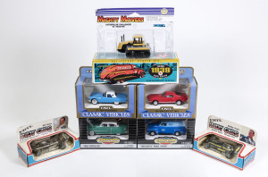 ERTL: Group of model vehicles including 1939 Dodge Airflow Locking Coin Bank (1233); and, ’64 ½ Mustang (2586); and, Farm Classics Case 800 Tractor (2616). All mint in original cardboard packaging. (35 items)