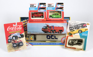 Miscellaneous group of model cars including ROSENBAUER: Panther 8x8 Air Crash Fire Tender (S); and, ERTL: Chevrolet Coca Cola Money Bank (B901); and, SZE TOY: Beep Beep Truck and Trailer (2201-4). All mint in original packaging. (35 items)