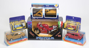 Miscellaneous group of model cars including GAMA: Schulbus VW LT (447); and, SCHABAK: VW Golf GTI; and, PROTAR: 1:9 scale Ducati (851). All mint in original cardboard packaging. (35 items approx.)